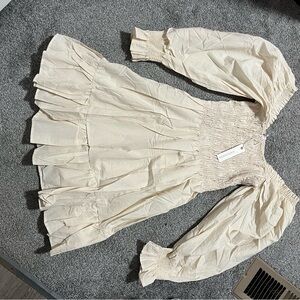 Olivaceous Cream Off Shoulder Long Sleeve Smocked Tiered Linen Mini Dress